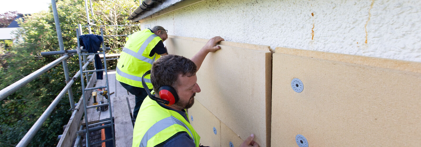 engineers retrofitting a house