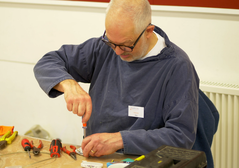 Person using a screwdriver