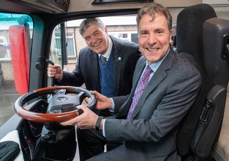 Managing Director of Massey Wilcox Robert Wilcox with Metro Mayor Dan Norris in a truck cab