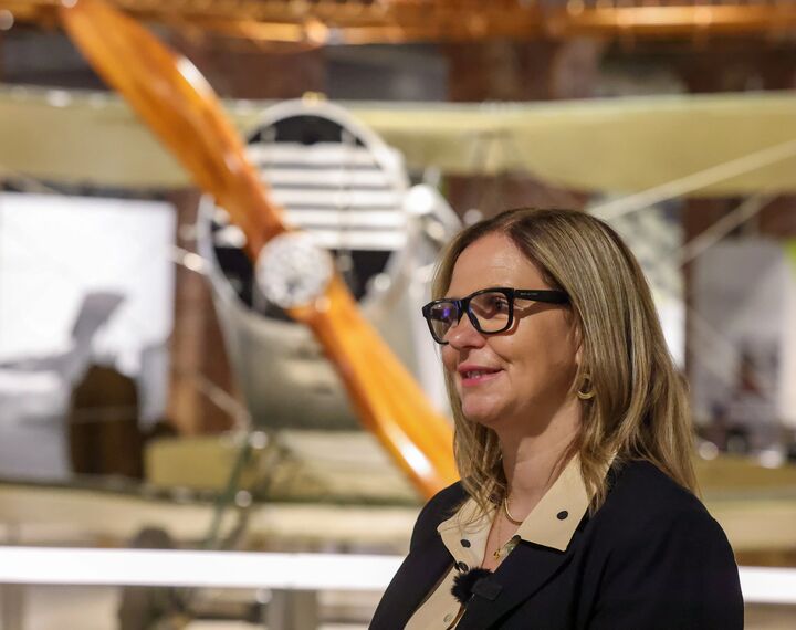 Helen Godwin, the new Mayor of the West of England, is pictured in front of a plane at Aerospace Bristol museum.