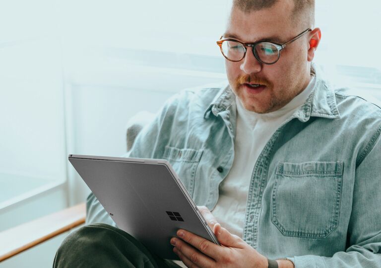 person works at a tablet